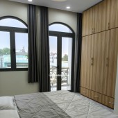 Nhà 1 trệt 2 lầu 12x8,5 Xây dựng 8x8,5 BTCT 4PN 4WC, có Gara Ô tô riêng