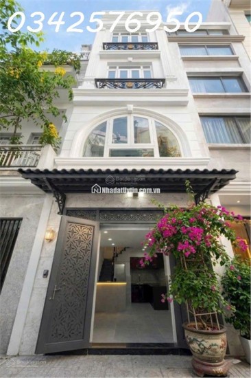 Bán nhà 2 tầng 21m² Nguyễn Thần Hiến, Q.4, 5.6 tỷ, sổ đỏ.